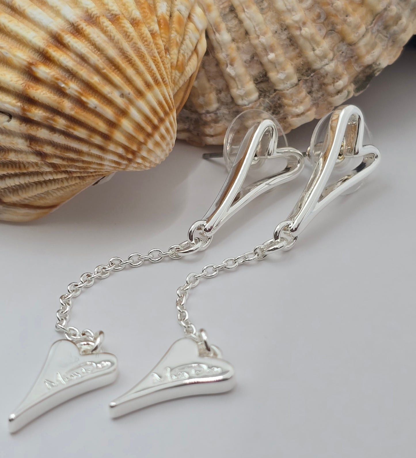 SILVER HOLLOW HEART EARRINGS*