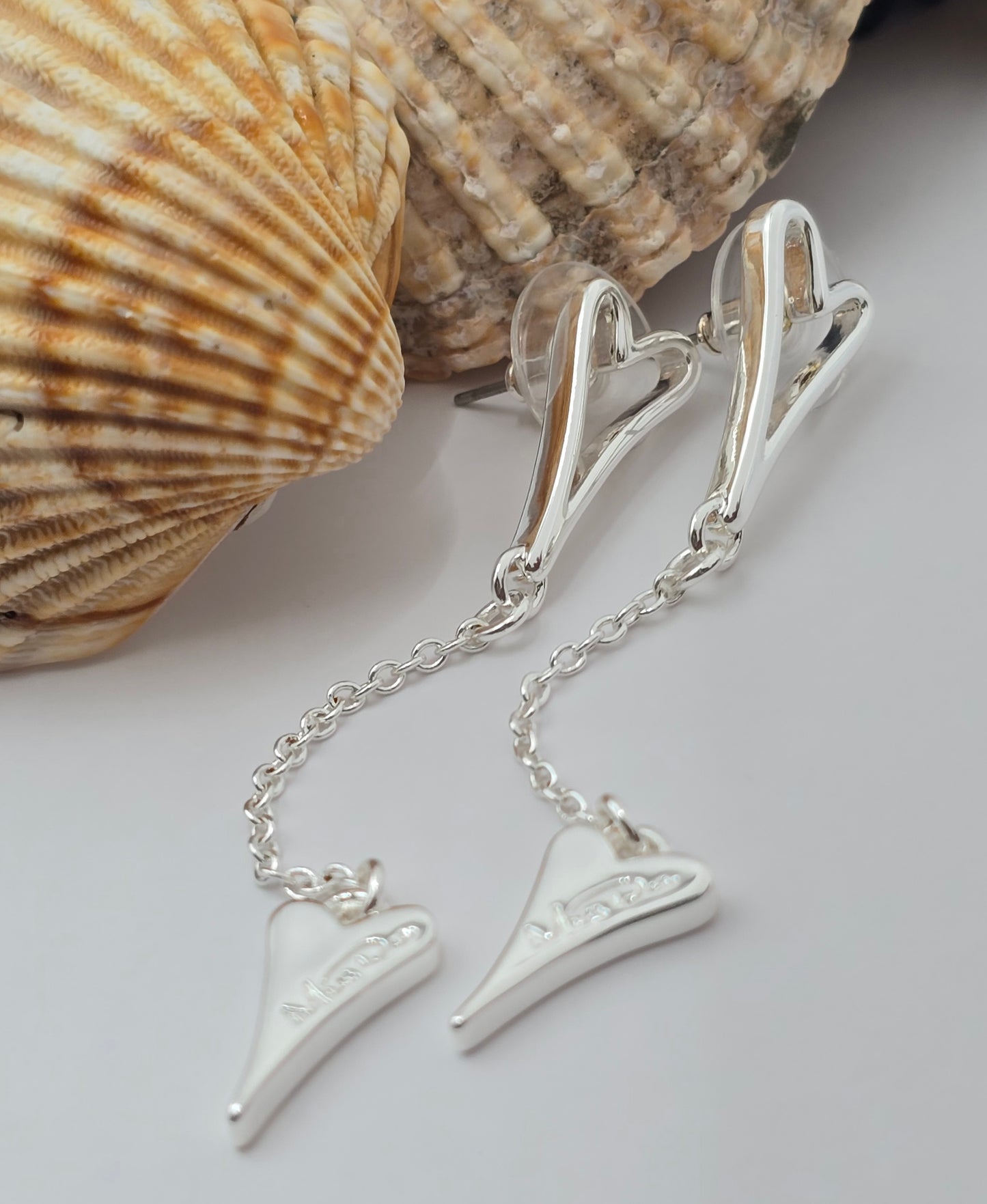 SILVER HOLLOW HEART EARRINGS*