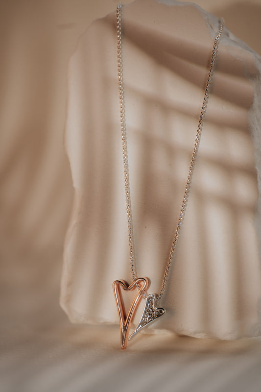 Necklace 2 tone with Hollow and Diamante hearts pendant *