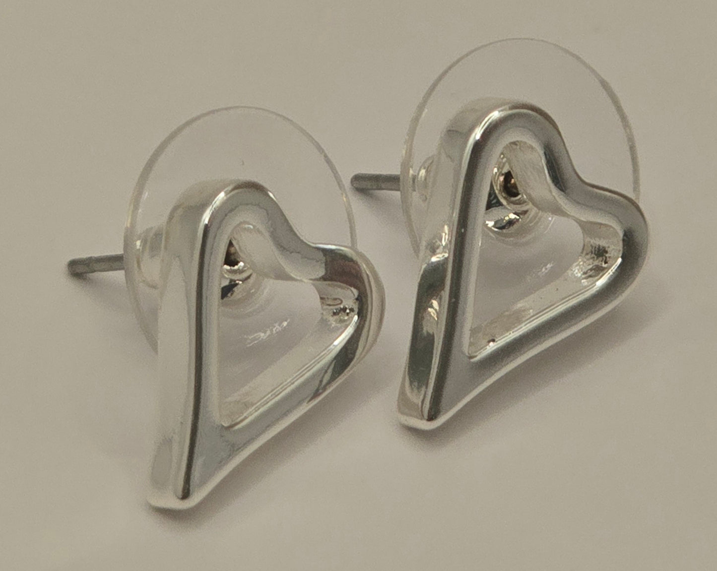SILVER HOLLOW HEART EARRINGS*