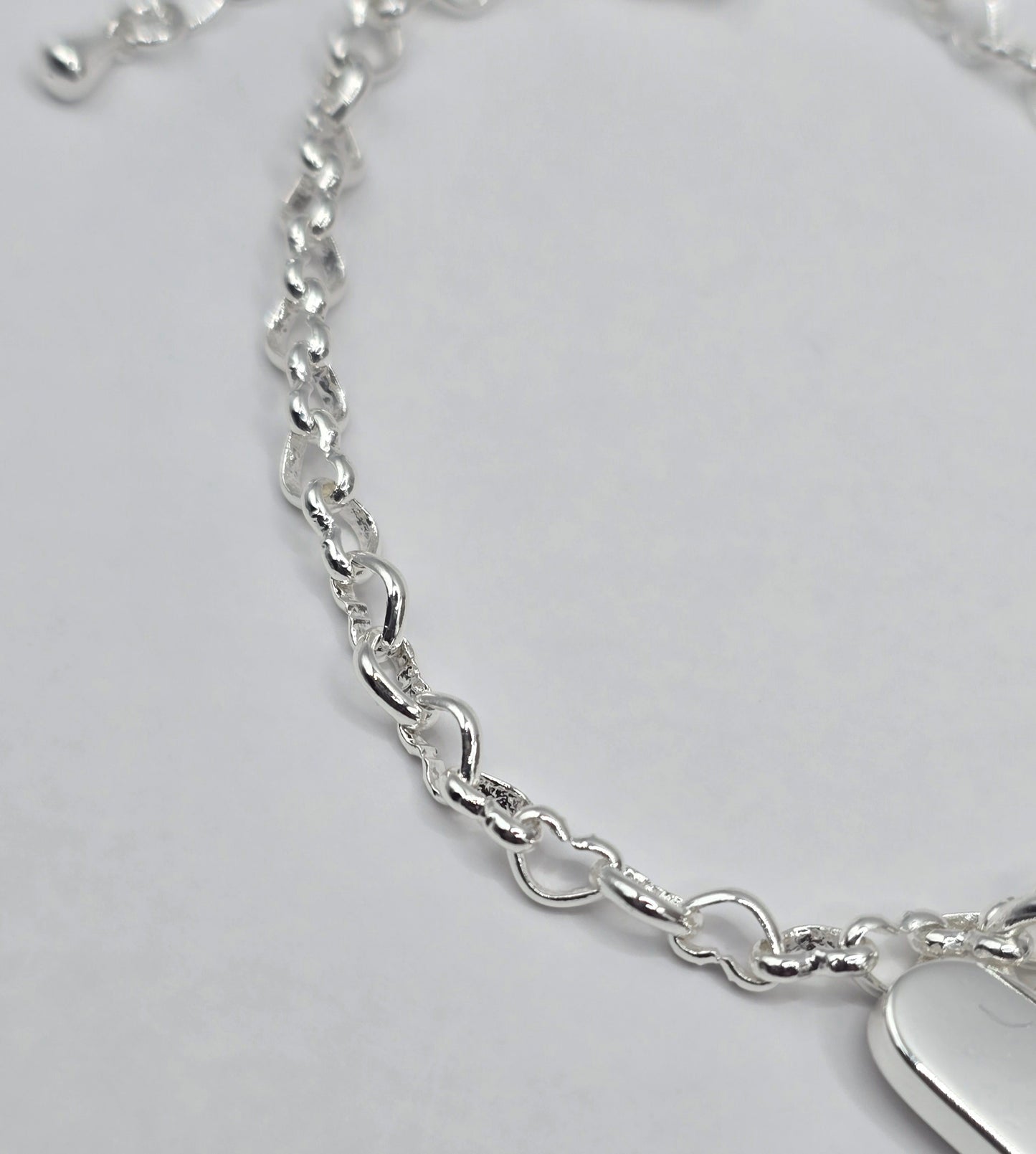 SILVER SOLID BRAND LOGO HEART BRACELET*