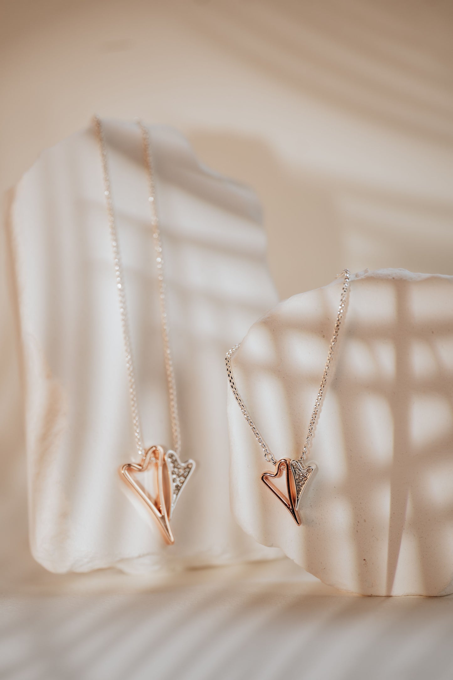 Necklace 2 tone with Hollow and Diamante hearts pendant *