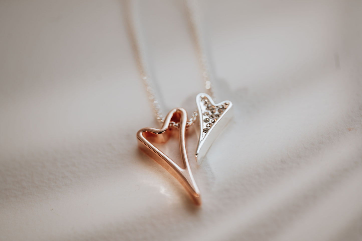 Necklace 2 tone with Hollow and Diamante hearts pendant *