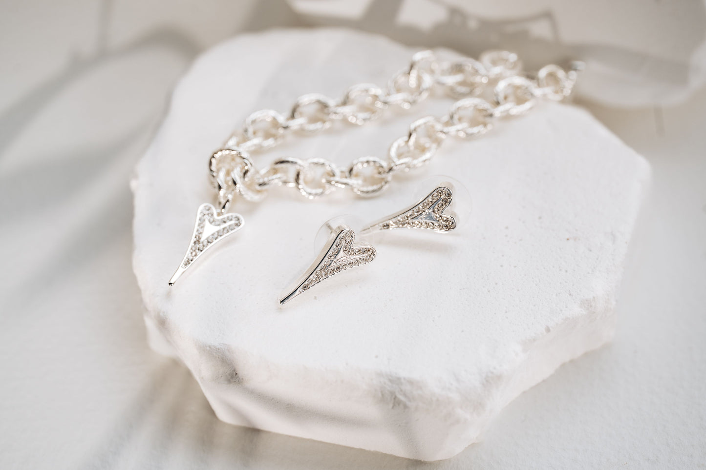 SILVER SOLID CZ MISS DEE LOGO EARRINGS*